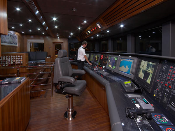 Captain on superyacht bridge